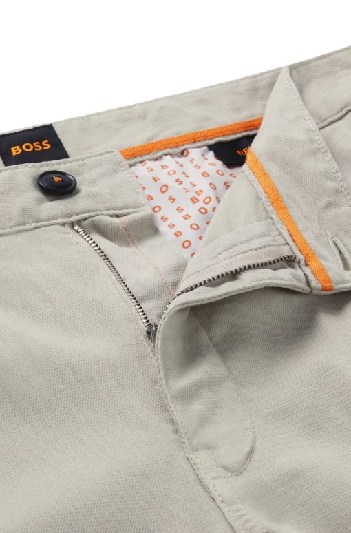 Herren Boss Orange Chino aus Stretch-Baumwolle mit Dobby-Struktur und Bundfalten