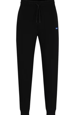 Herren Hugo Blue Jogginghose aus Baumwoll-Terry mit blauem Logo-Aufnäher