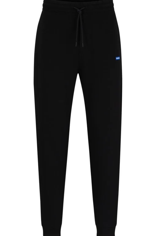 Herren Hugo Blue Jogginghose aus Baumwoll-Terry mit blauem Logo-Aufnäher